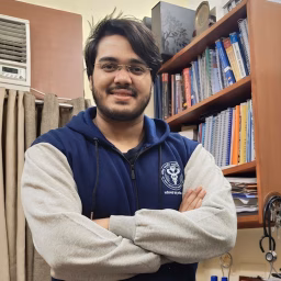 Dr Aman Tilak, MBBS, MD