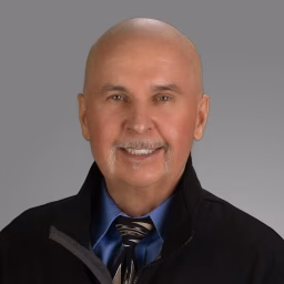 Larry B. Mellick, MD